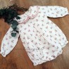 Pelele niña flores rosa