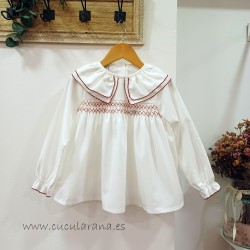 Blusa blanca de niña cuello...