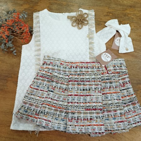 Noma Fernandez blusa y falda plisada yuca