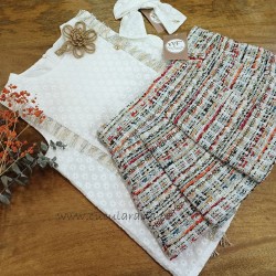 Noma Fernandez blusa y falda plisada yuca