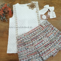 Noma Fernandez blusa y falda plisada yuca