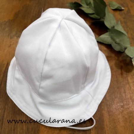 estante zapatilla humedad gorro de bebe de playa en color blanco coleccion primavera verano de la  firma balancete